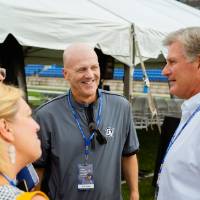 Randy Damstra talking with guests at the Jamie Hosford Football Center dedication.